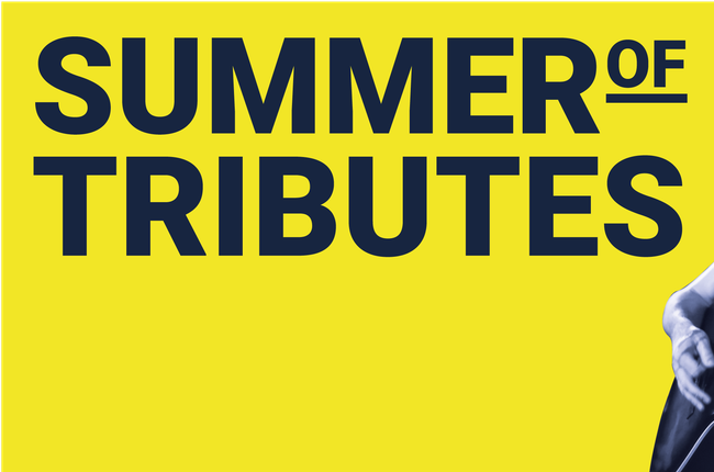 Reads "Summer of Tributes" a man wearing a cap backwards plays an acoustic guitar. He wears a white short sleeved shirt and had a moustache