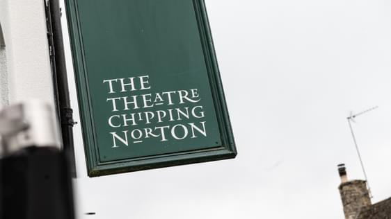Green Chipping norton theatre hanging swing sign