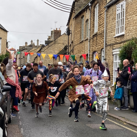 All the runners start the race