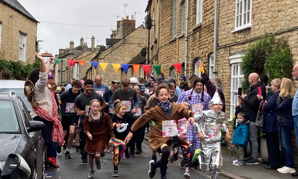 All the runners start the race