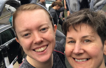 Two people dressed as donkeys with ears and tails