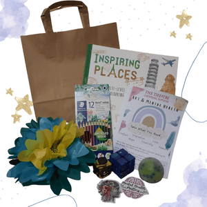 A photo of a mental health pack with mindful colouring book, colouring pencils, stickers, a tissue paper flower, fidget cubes and booklet.