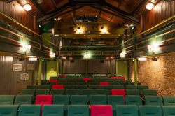 The auditorium, seen from the stage for private cinema hire