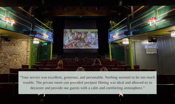 Auditorium set-up with cinema screen, alongside a quote from a hirer
