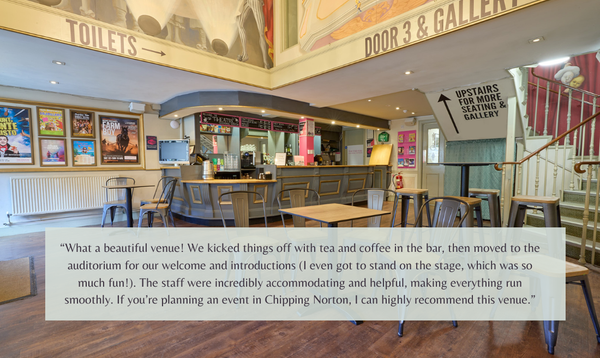The bar set-up with tables and chairs, alongside a quote from a hirer